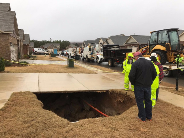 Sinkhole Hits Hampton Cove Front Yard